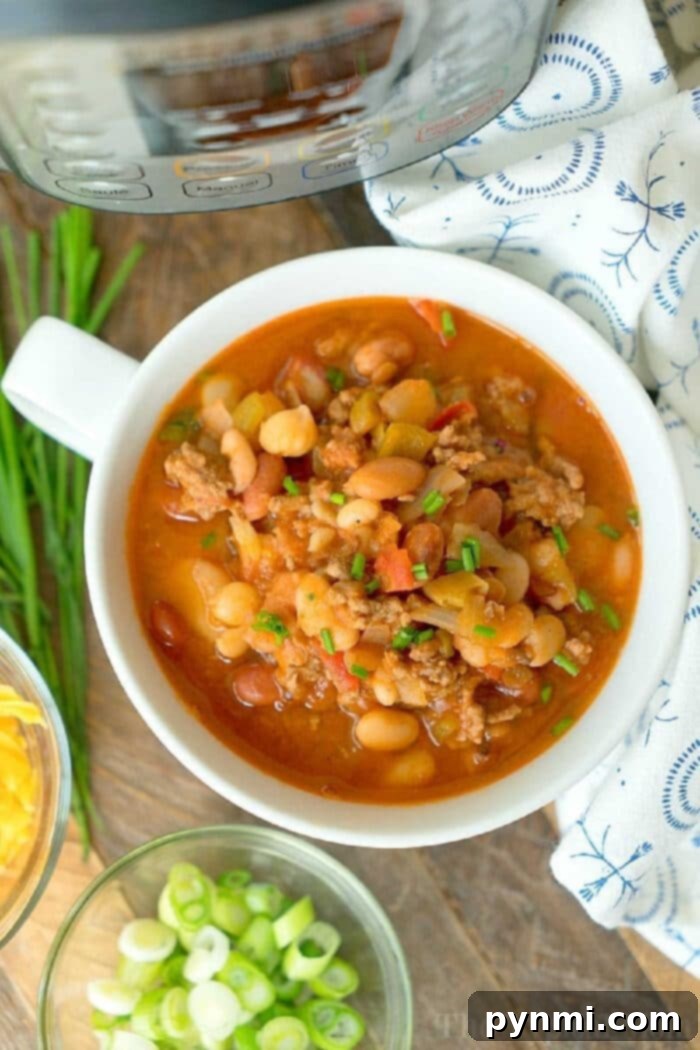Family-Friendly Pressure Cooker Chili A hearty bowl of pressure cooker chili with dry beans, ready to serve