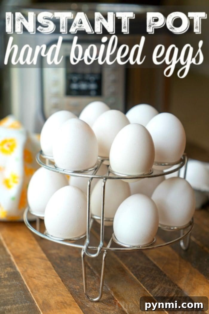 Eggs rest on a metal rack, ready to become instant pot hard boiled eggs in no time.