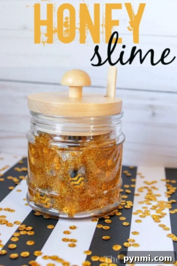 Learn how to make dazzling honey slime with glue and gold glitter. This easy recipe includes fun plastic bees for a buzzing good time, perfect for parties or weekend crafts. #honey #slime #gold #glitter #glue #easy #ingredients Close-up of golden honey slime with glitter and small plastic bees inside.