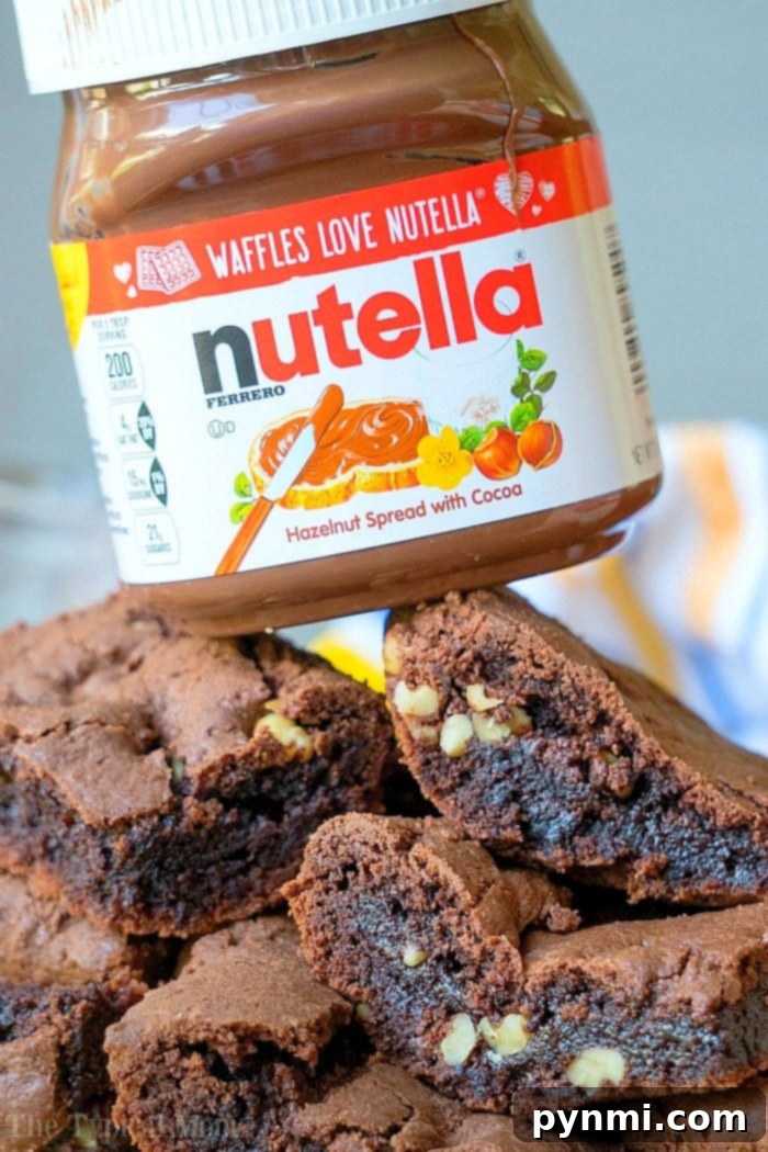 Brownies from cake mix Devils food variety are amazing. If you've never made Nutella brownies out of cake mix let me show you what you've been missing! #cakemix #brownies #nutella Finished brownies from cake mix, ready to be served