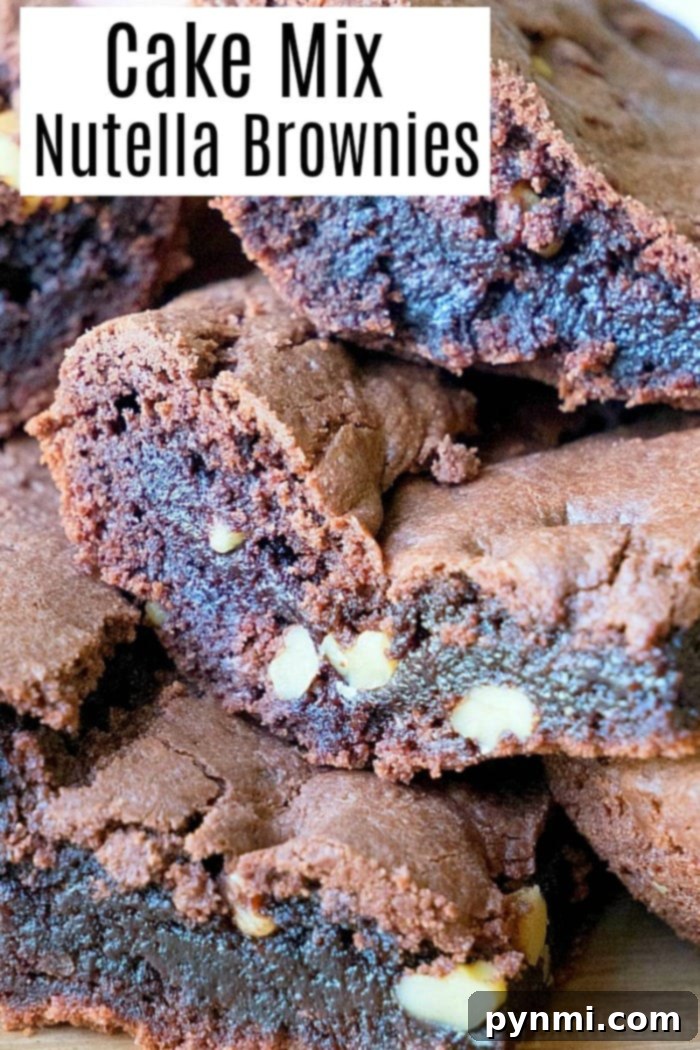Brownies from cake mix Devils food variety are amazing. If you've never made Nutella brownies out of cake mix let me show you what you've been missing! #cakemix #brownies #nutella Delicious brownies from cake mix, served and ready to eat