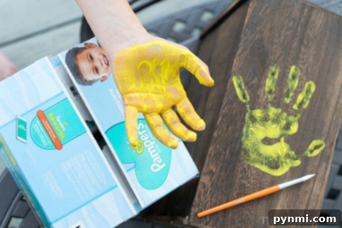 Perfect Presents for Educators 3 Close-up of a child's handprint being made on paper with colorful paint