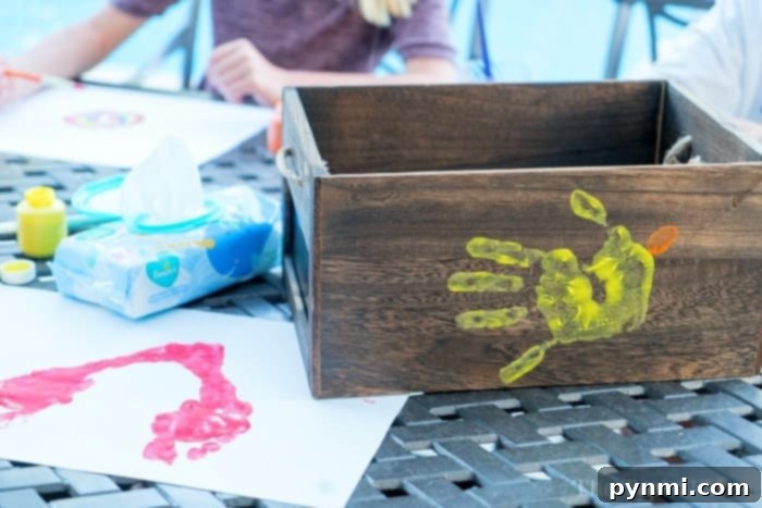 Perfect Presents for Educators 4 Finished butterfly handprint art with added decorations and personalized message