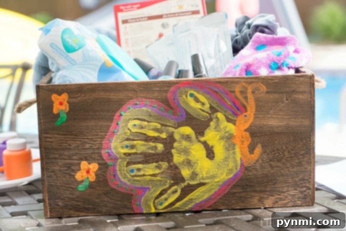 Perfect Presents for Educators 5 Gift box filled with comfort items alongside butterfly handprint art