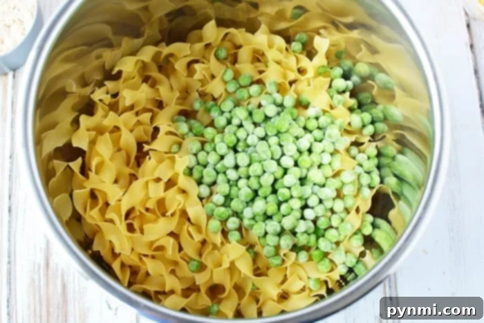 instant pot tuna casserole with golden, melted cheese on top