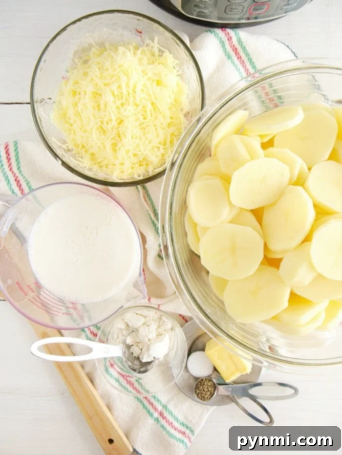 Pressure cooker scalloped potatoes recipe you can use as the perfect cheesy side dish for the holidays or year round with dinner. #instantpot #pressurecooker #scalloped #potatoes #cheese #augratin #sidedish #potato Ingredients for homemade Instant Pot scalloped potatoes: sliced potatoes, shredded cheese, milk, flour, butter, and seasonings displayed on a kitchen towel.