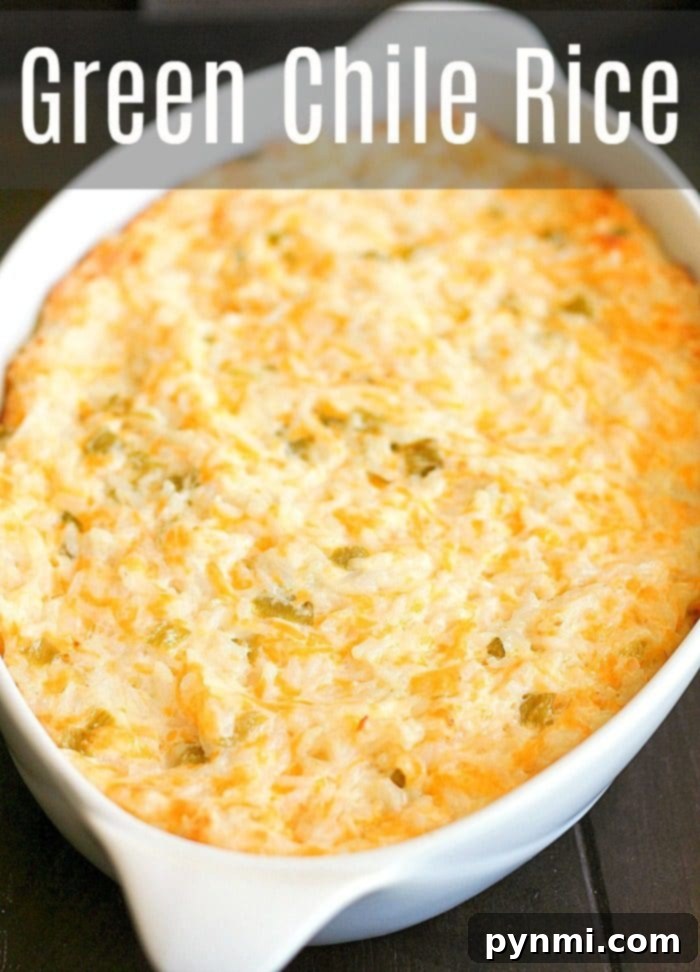 Here's a great green chile rice side dish you can make and serve during the holidays or throughout the year for dinner. Cheesy and full of flavor! #green #chile #chiles #hatch #casserole #rice Close-up of a serving of green chile rice casserole on a plate, showing its creamy texture and melted cheese.