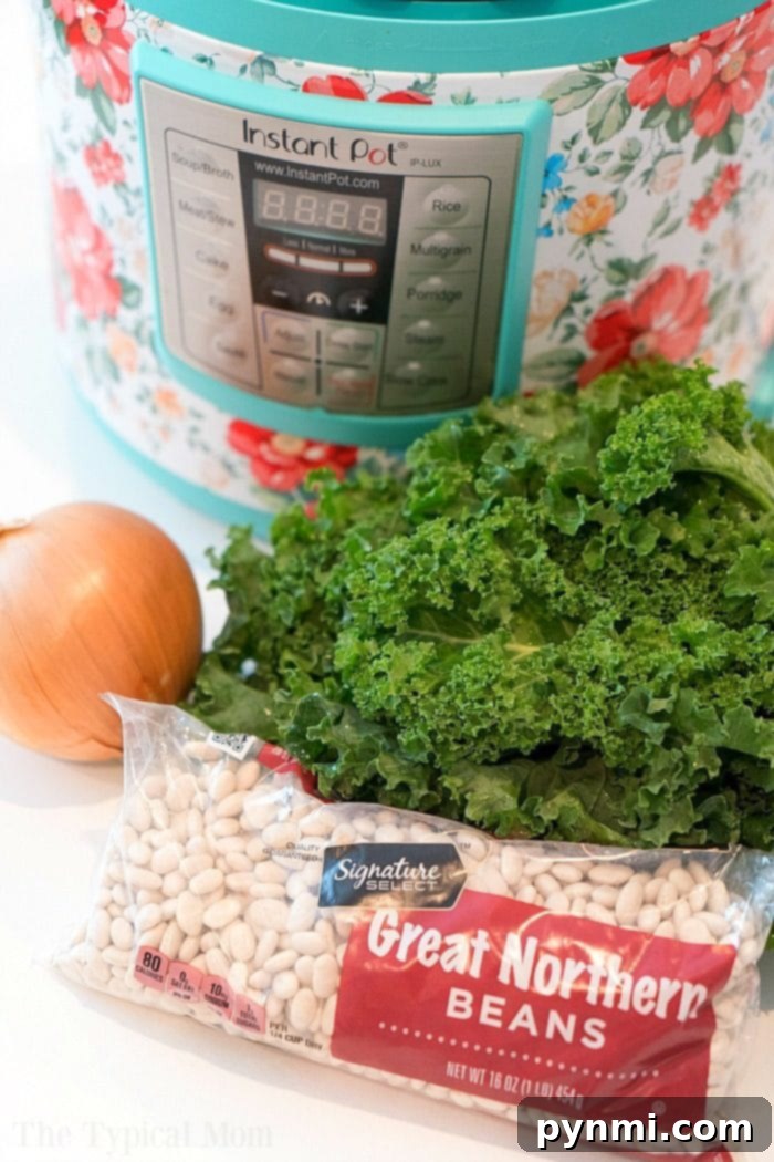 Pressure cooker sausage soup is packed with flavor and can be made with or without kale. Using canned or dry beans it's the perfect dinner. #instantpotrecipes #sausagesoup #soup #kale #pressurecooker #instantpot #thetypicalmom #drybeans #sausage instant pot sausage kale bean soup