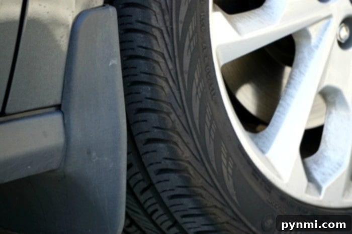 A close-up of car tires, emphasizing the importance of tire safety and maintenance for new drivers.
