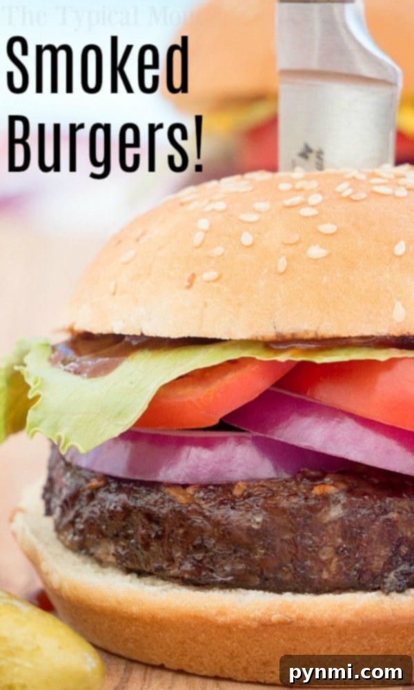 Perfectly smoked burgers, ready for toppings and a flavorful meal.