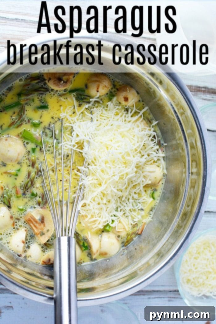 This asparagus casserole recipe is great! A cheesy casserole that is great with leftover ham inside, the perfect breakfast casserole to start the morning. #asparagus #casserole #ham #leftoverhamrecipes #leftoverham #egg #cheese #breakfastcasserole #breakfastbake A mixing bowl filled with chopped asparagus, mushrooms, shredded cheese, and beaten eggs sits next to a whisk. The text reads Egg Asparagus Casserole Recipe for a delicious breakfast delight.