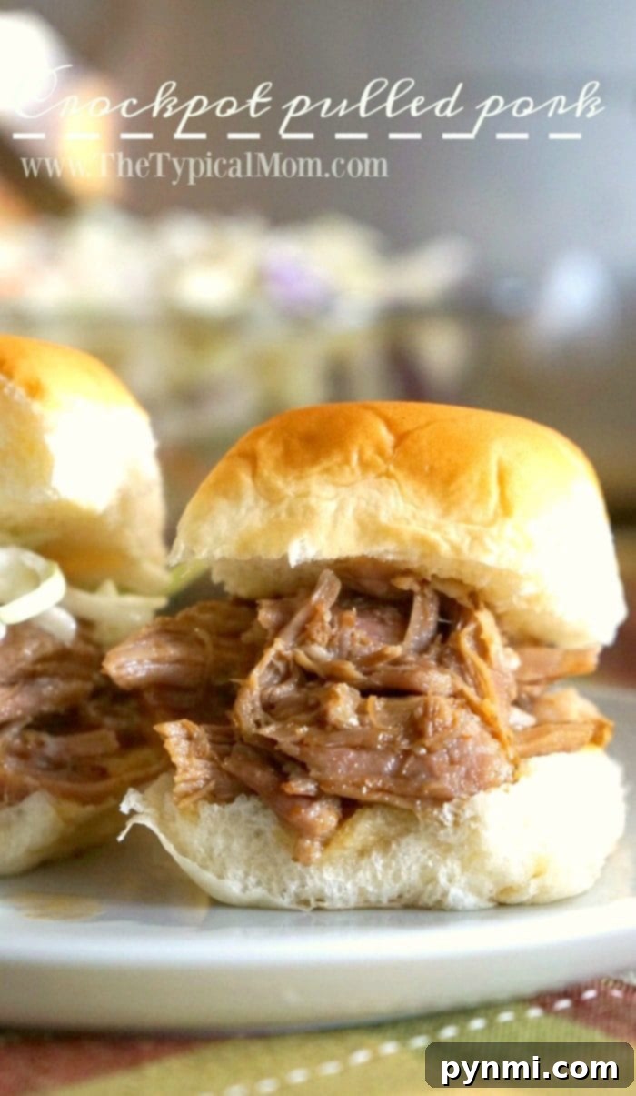 Sweet and Smoky Dr Pepper Slow Cooker Pulled Pork 9 Barbecue pulled pork in a Crock-Pot, ready for a delicious meal.
