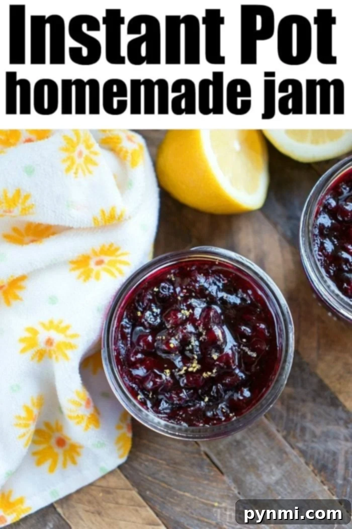 Homemade Strawberry Jam in the Pressure Cooker Instant Pot strawberry jam in a mason jar.