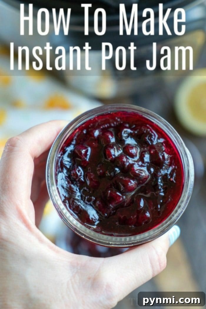 Homemade Pressure Cooker Jam Ready to Enjoy Two small jars of homemade pressure cooker jam and a bowl of fresh berries.