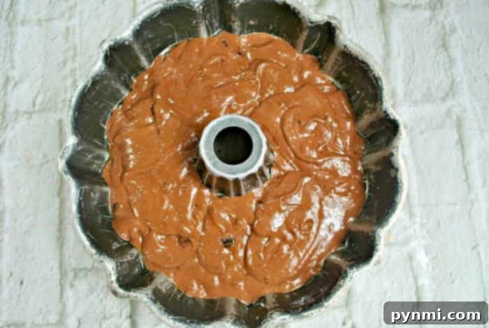 Try this rum bundt cake this Christmas and see if it's your favorite holiday dessert too! Topped with bacon with a rich chocolate flavor it's so yummy. #rum #cake #bacon #bundtcake Rum Bundt Cake 2