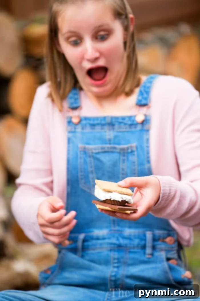 Smores dessert recipes are to die for! If you want to skip the campfire and bake a marshmallow, chocolate and graham cracker treat in your oven tonight we have a lot of ideas. #smores #dessert #marshmallow #chocolate #grahamcracker #cake #brownies Gooey S'mores Brownies with Melted Marshmallows and Chocolate Drizzle