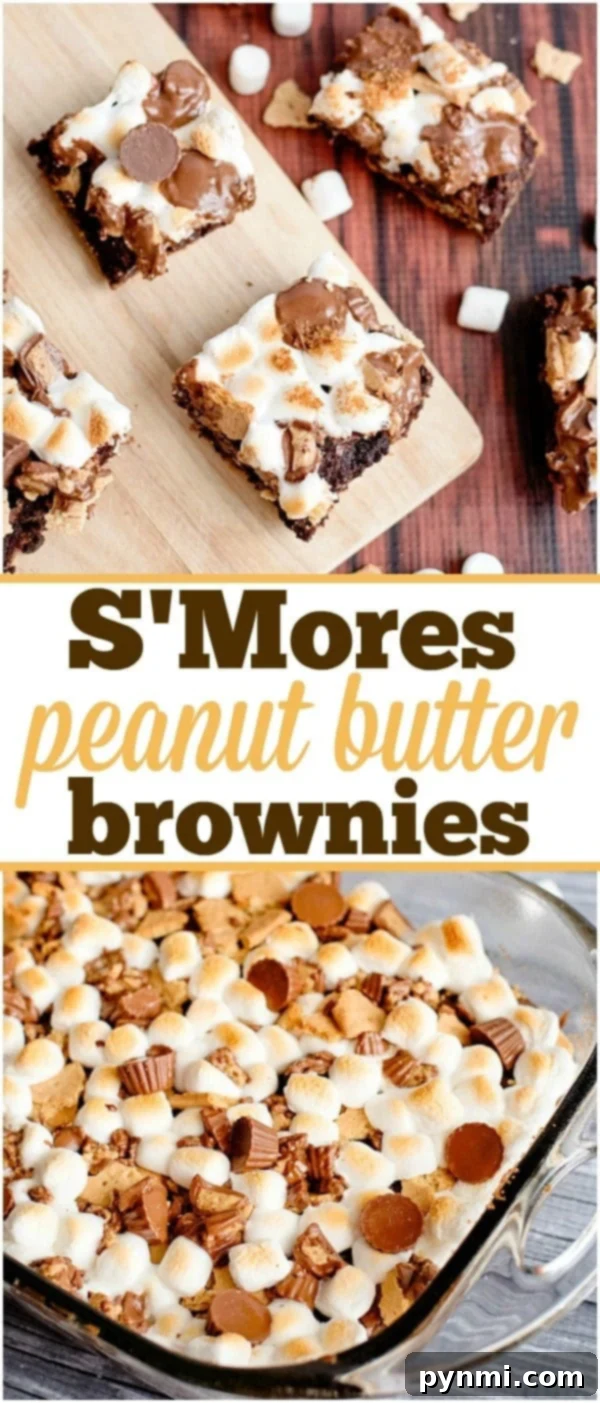 Smores dessert recipes are the best! Brownies with a smore topping or a jazzed up poke cake with marshmallows and graham crackers are our fave. #peanutbutter #brownies #marshmallow #smores Close-up of baked Peanut Butter Cup S'mores Brownies, showcasing the layers