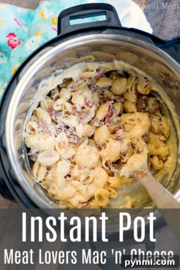 Meat lovers pressure cooker mac and cheese recipe is creamy and filled with bacon and sausage! A hearty Instant Pot dinner anyone will love for sure. #instantpotrecipes #pressurecooker #macandcheese #macaroniandcheese #meatlovers #sausage #ninjafoodi #ninjafoodirecipes #bacon #pasta #macaroni #dinner #thetypicalmom instant pot homemade macaroni and cheese