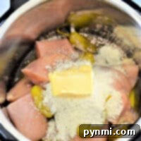 Raw chicken breasts, butter, pickles, and seasonings come together perfectly in an Instant Pot for a delicious meal. Wondering how long to cook chicken in a pressure cooker? Just a few minutes can deliver tender perfection.