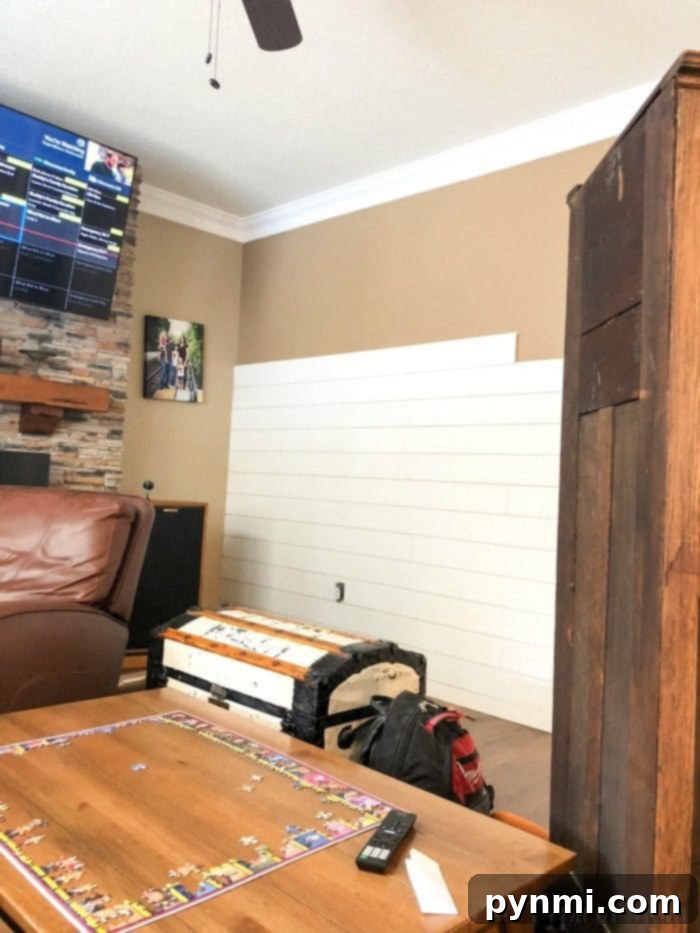 Mid-Progress Photo of DIY Shiplap Accent Wall in Living Room DIY Shiplap Accent Wall Progress Shot 2