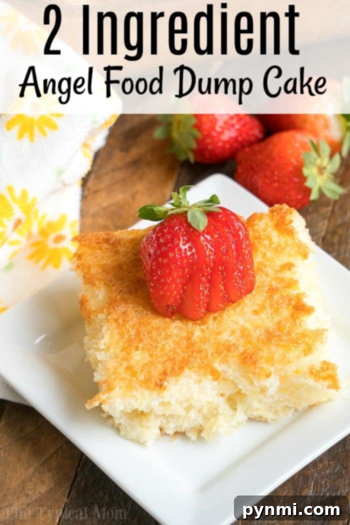 Heavenly Pineapple Delight 6 A slice of pineapple angel food dump cake topped with fresh sliced strawberries rests on a white plate, next to a blue patterned napkin.