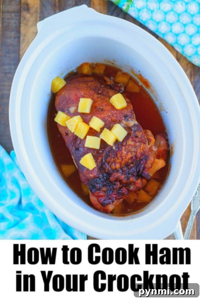 A mouth-watering image demonstrating how to cook ham in your Crockpot, showcasing the tender and glazed result of this effortless slow cooker ham recipe.