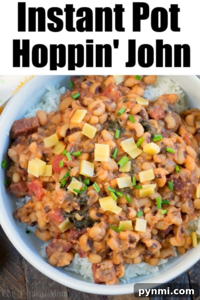 A bowl of Instant Pot Hoppin' John with black-eyed peas, ham, and greens, ready to be served