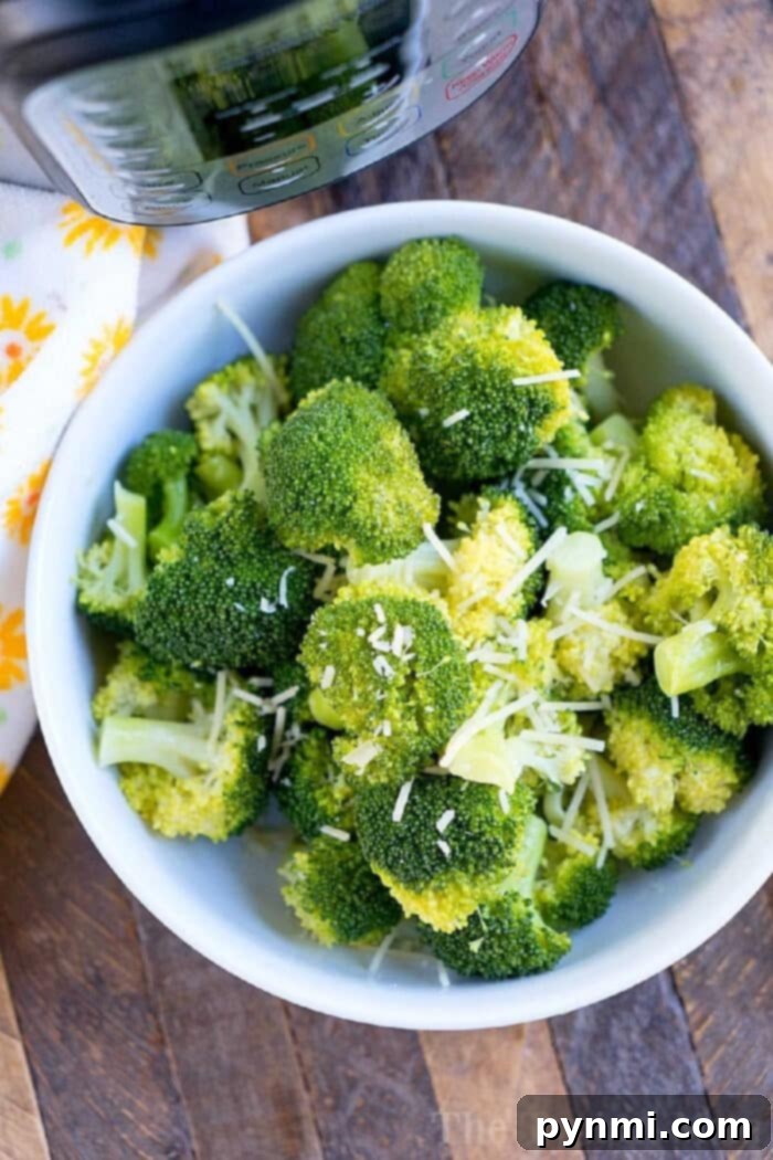 Perfectly steamed Instant Pot broccoli in a serving bowl, ready to be enjoyed.