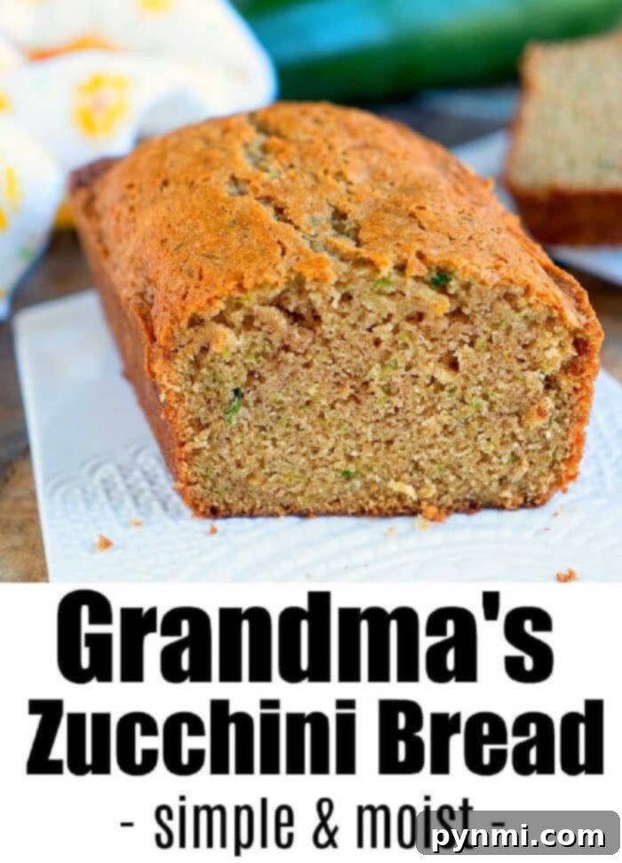 Close-up of a perfectly baked loaf of Moist Zucchini Bread, ready to be enjoyed as a family favorite.