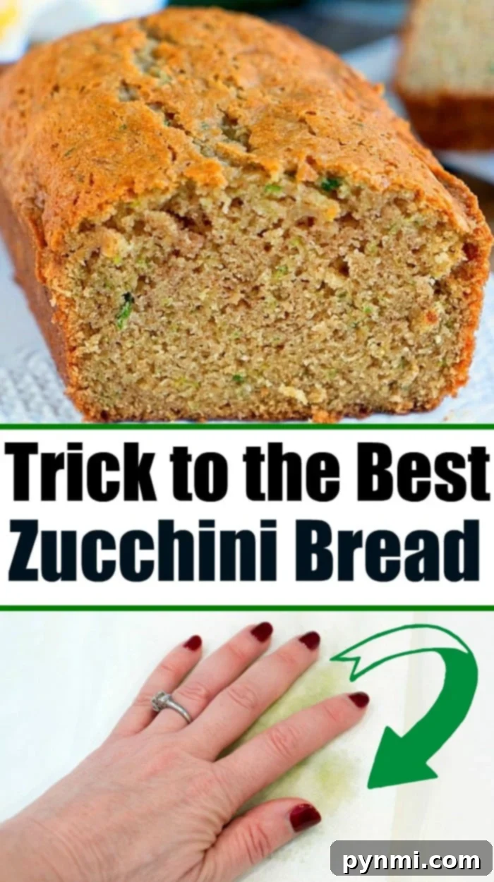 The best zucchini bread, golden brown and sliced, ready to be enjoyed. A perfect example of a moist zucchini bread recipe.