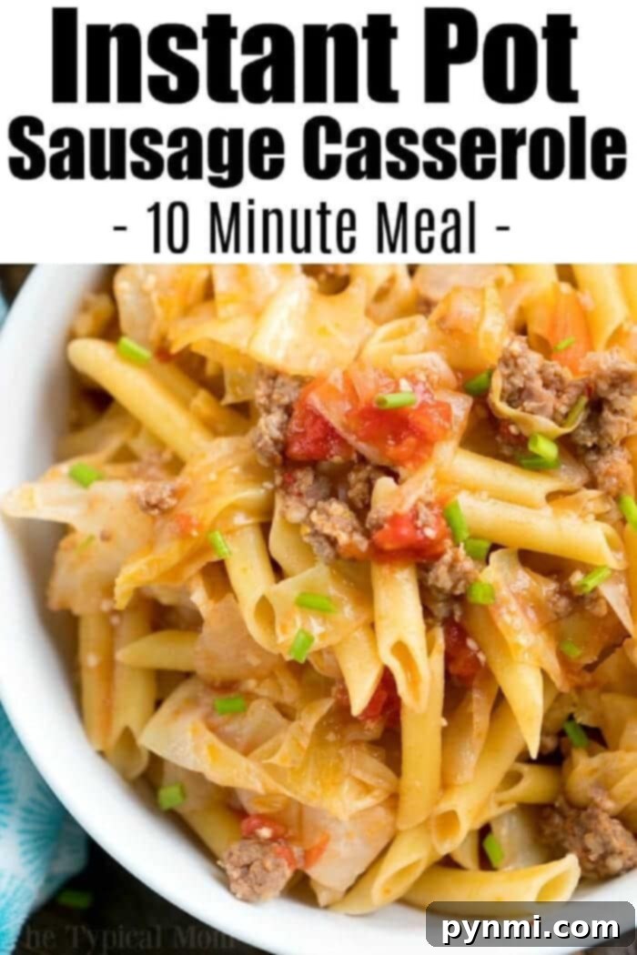 A vibrant bowl of penne pasta casserole featuring savory sausage, rich diced tomatoes, and fresh chopped chives. This 10-minute Instant Pot meal is inspired by classic pressure cooker sausage and cabbage flavors, ready to enjoy.