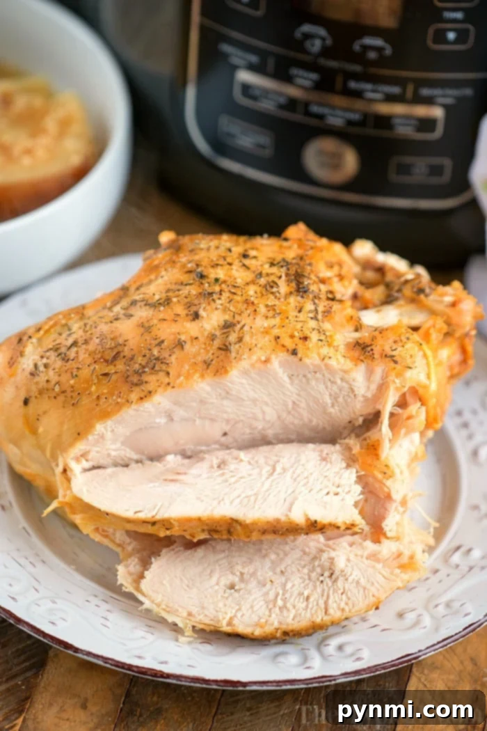 Savory Main Dishes for Your Christmas Brunch Menu: Turkey, Ham, and More Perfectly cooked Ninja Foodi turkey breast, sliced and ready to serve at a Christmas brunch