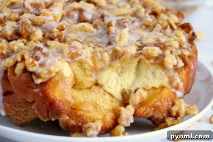 Sweet Treats for Christmas Brunch: Monkey Bread, Cinnamon Rolls, and More Delicious Ninja Foodi monkey bread, golden brown and drizzled with glaze, ready for Christmas brunch