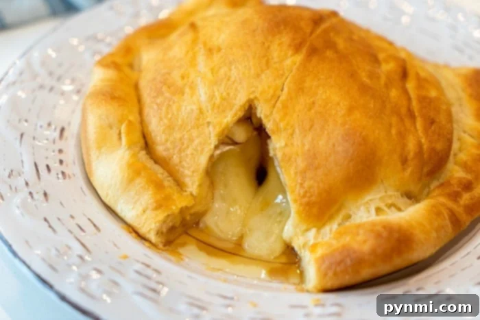 Gourmet and Easy Christmas Brunch Buffet Ideas Air fryer baked brie with fruit and crackers, a gourmet appetizer for Christmas brunch