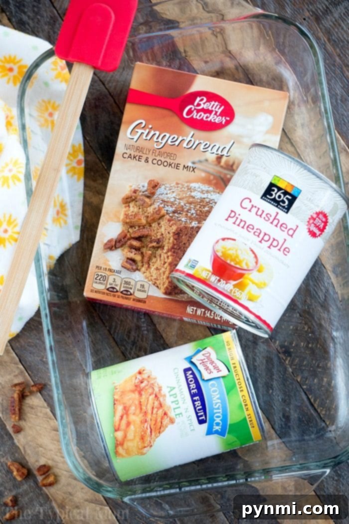 This gingerbread dump cake is moist and delicious with all the Christmas flavors you crave! Serve an easy gingerbread cake for brunch of dessert this year. #gingerbread #dumpcake #cake #dessert #christmas #easy #thetypicalmom Christmas Gingerbread Dump Cake, moist and delicious
