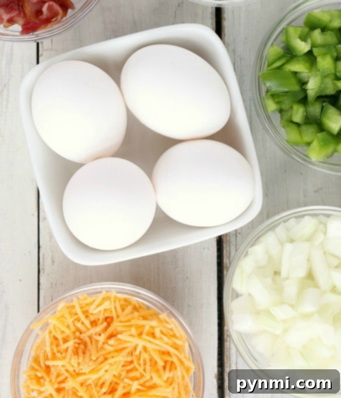 Fluffy Instant Pot Egg Bites 4 A collection of Instant Pot Egg Bites neatly arranged on a rustic wooden cutting board
