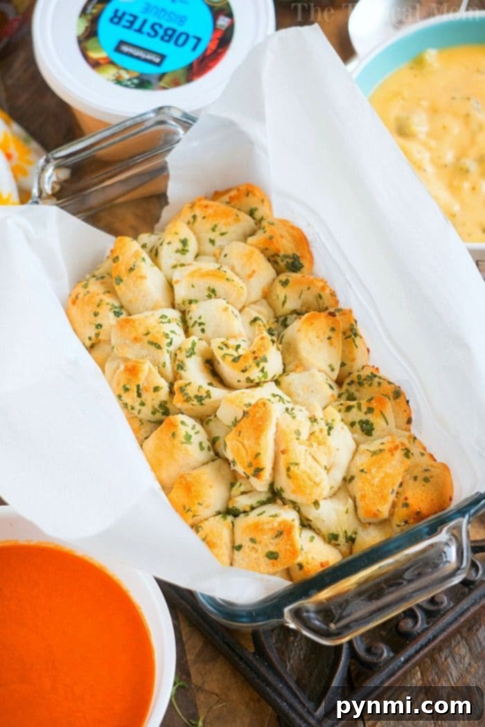 Quick Garlic Pull Apart Bread Recipe with Refrigerated Biscuits Delicious garlic pull apart bread, made from refrigerated biscuits, paired with soup for a quick and easy family meal.