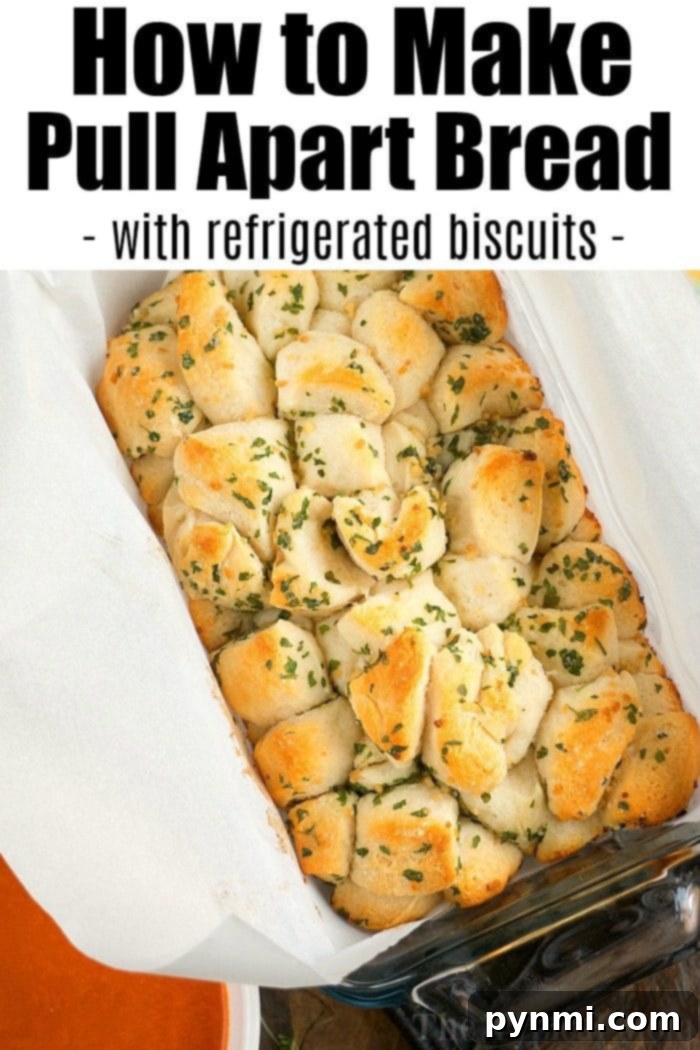 Refrigerated Biscuit Garlic Pull Apart Bread - Fast & Delicious Close-up of golden brown, savory biscuit pull apart bread, glistening with garlic butter, ready to be served.