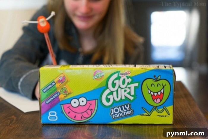 Kids enjoying Yoplait Jolly Rancher Go-Gurt yogurt as a fun snack