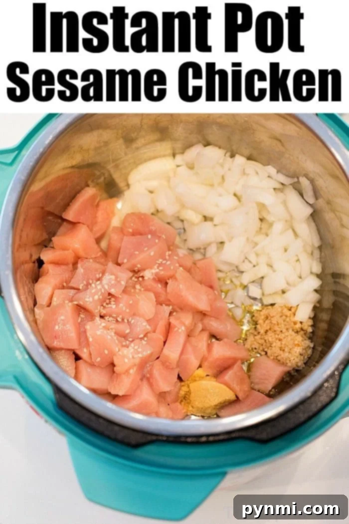 Instant Pot sesame chicken, garnished with sesame seeds and green onions