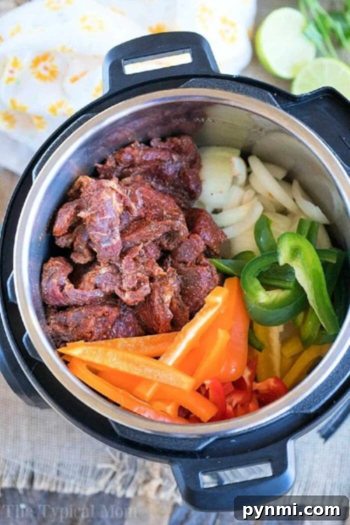 Instant Pot beef fajitas with colorful bell peppers, onions, and perfectly cooked steak strips ready to serve