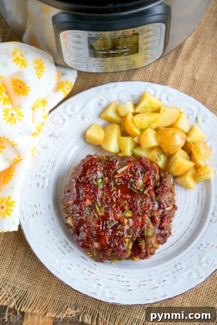 Easy Instant Pot meatloaf and potatoes served on a plate