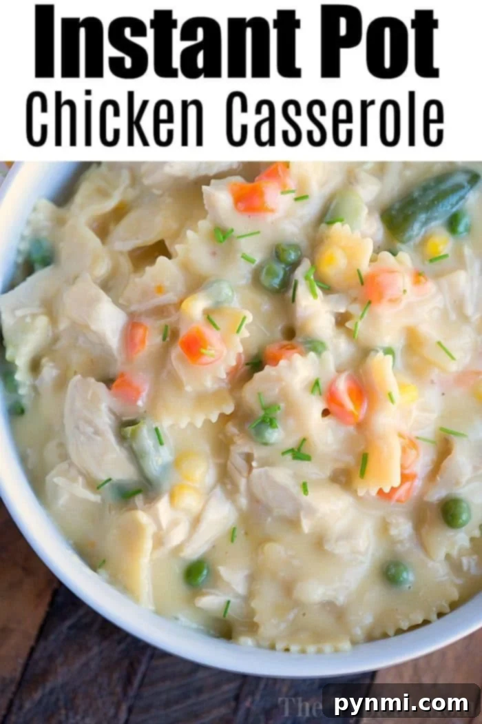 A vibrant and appealing pressure cooker chicken casserole in a serving dish, topped with fresh parsley. The image highlights the rich texture and wholesome ingredients, perfect for a family dinner.