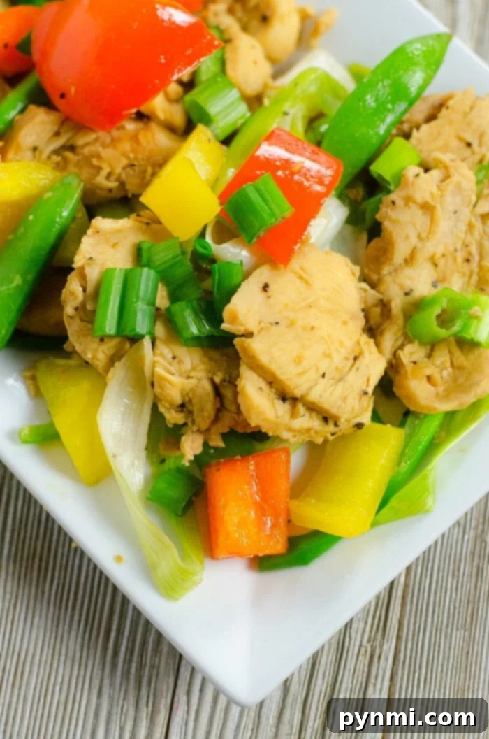 Instant Pot Stir Fry Express 2 A vibrant and healthy Instant Pot chicken and vegetable stir fry, showcasing bell peppers, snap peas, and tender chicken in a savory teriyaki sauce, ready to serve as a delicious one-pot meal.