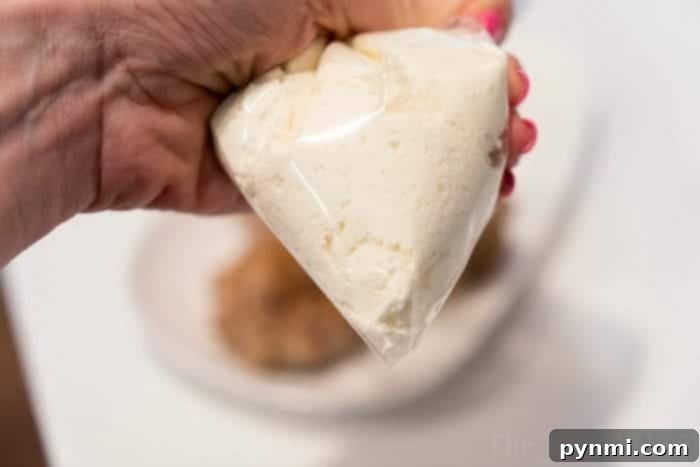 Close-up of cream cheese filled bagels, showcasing the creamy texture.