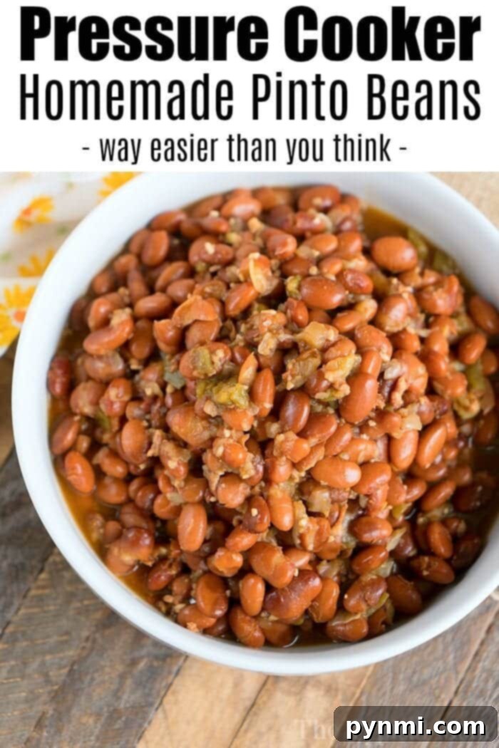 Instant Pot pinto beans make a great side dish for Cinco de Mayo or any time of year. Use charro beans inside burrito bowls for a great meal! #instantpotrecipes #instantpot #pressurecooker #ninjafoodi #pintobeans #beans #cincodemayo #thetypicalmom #charrobeans #ninjafoodirecipes A bowl of pressure cooker pinto beans, brown with a glossy finish, mixed with chopped peppers and onions. Text above the image reads: "Pressure Cooker Pinto Beans - way easier than you think.