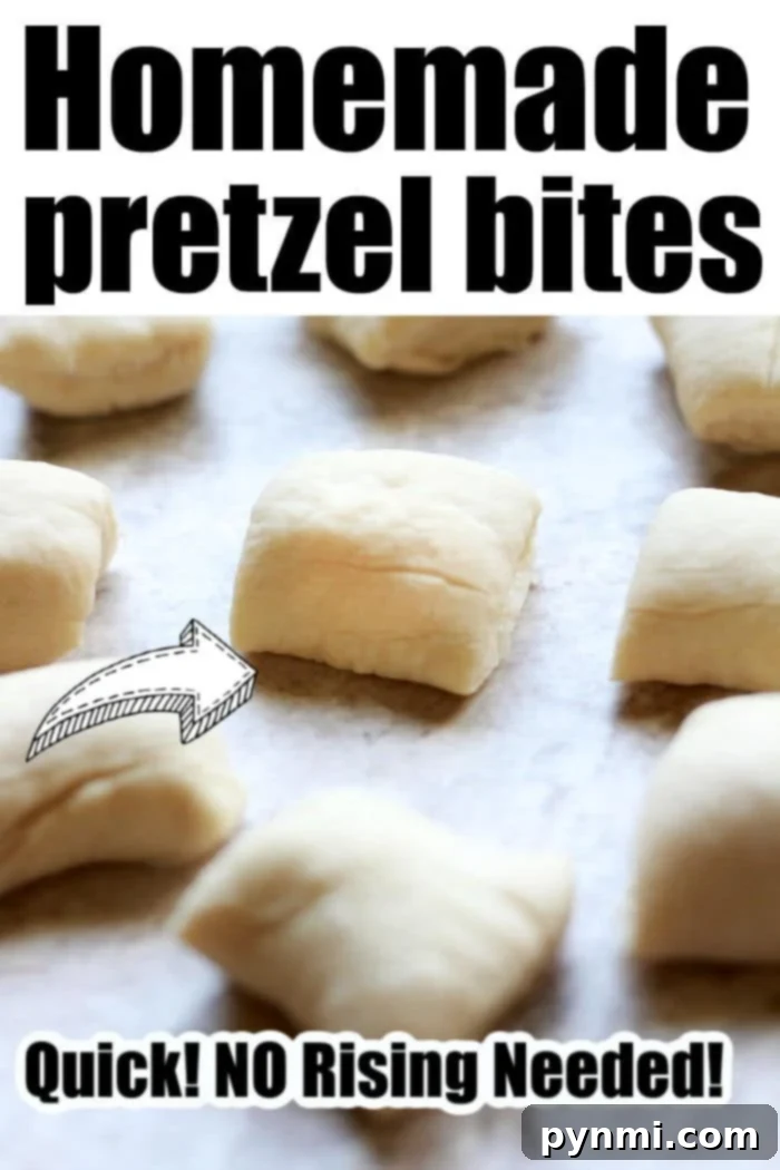 A basket overflowing with perfectly golden and salted homemade pretzel bites, ready for dipping.