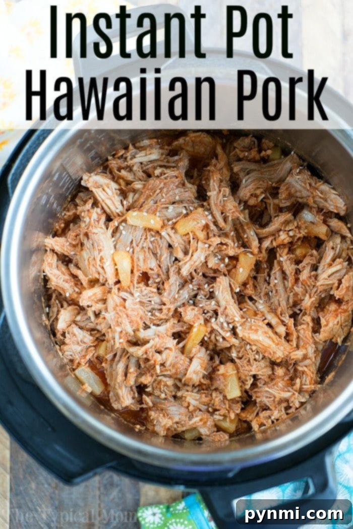 100 Instant Pot dinner recipes your whole family will love, including the kids! Have chicken, beef or pork you need to use? We have pressure cooker ideas for you! #instantpotrecipes #instantpot #dinners #dinner #beef #chicken #pork #thetypicalmom #pressurecooker Instant Pot Hawaiian pulled pork served in buns, garnished with pineapple.
