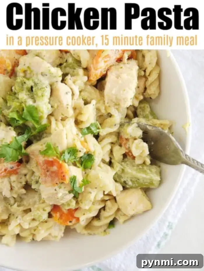 A vibrant bowl of Instant Pot chicken pasta, featuring spiraled noodles, tender chicken pieces, bright green broccoli florets, and sliced carrots in a luscious creamy sauce. Garnished with fresh herbs, the image highlights a perfect, quick family meal.