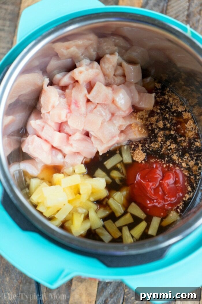 Instant Pot Hawaiian chicken is pineapple sweet with a bit of a kick. Served on top of rice or by itself it's one of our favorite pressure cooker dinners! #instantpotrecipes #instantpot #chicken #pineapple #hawaiian #sweet #thetypicalmom #ninjafoodirecipes instant pot hawaiian chicken 2